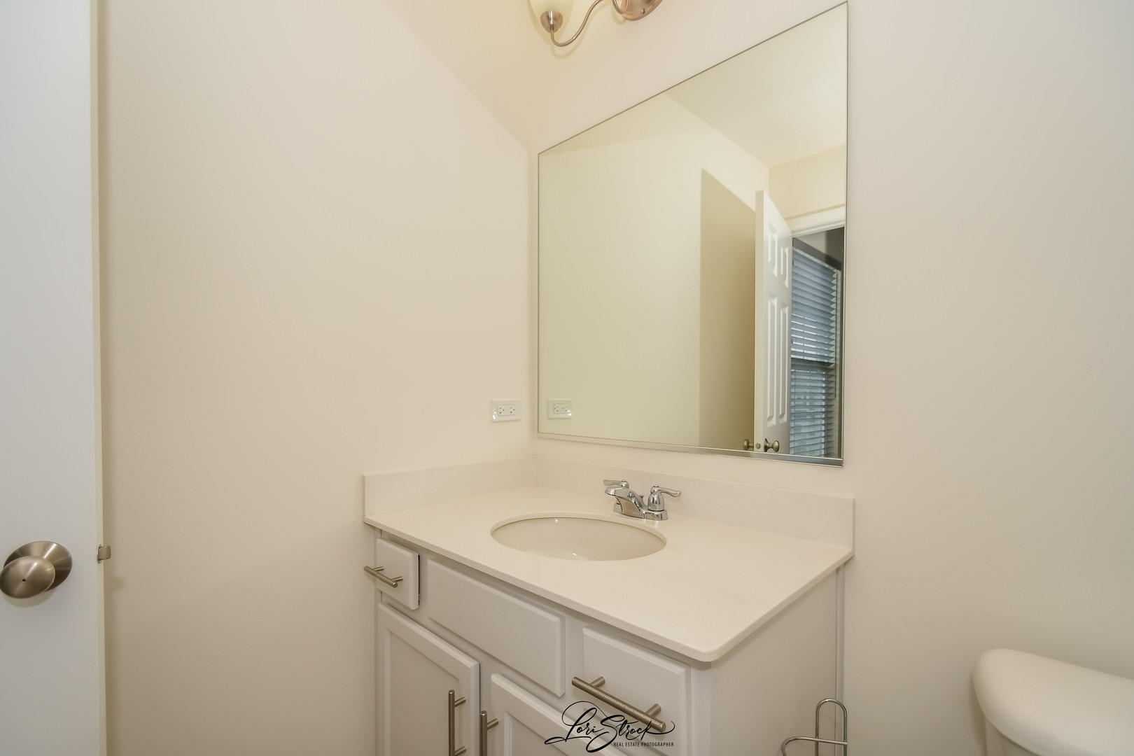 13926 South Addison Trail Homer Glen, IL 60491 - Photo 14 of 18 a bathroom with a sink and a mirror