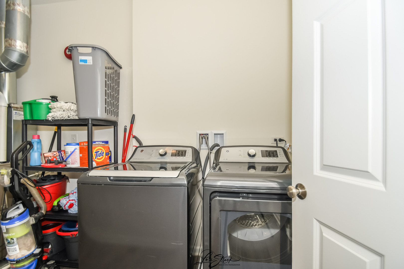 13926 South Addison Trail Homer Glen, IL 60491 - Photo 17 of 18 a utility room with dryer washer and empty racks