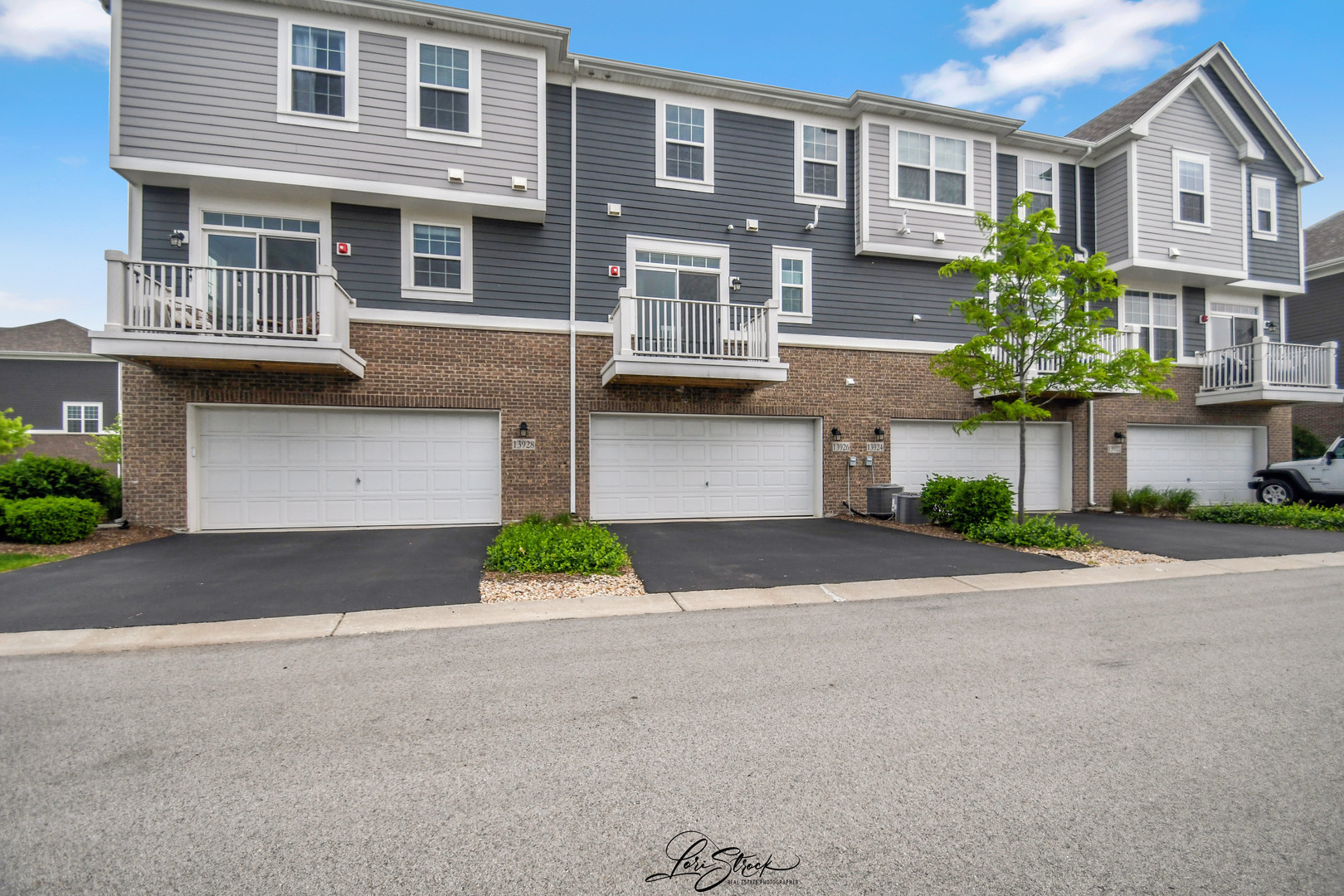 13926 South Addison Trail Homer Glen, IL 60491 - Photo 18 of 18 a front view of a building with a yard and a garage