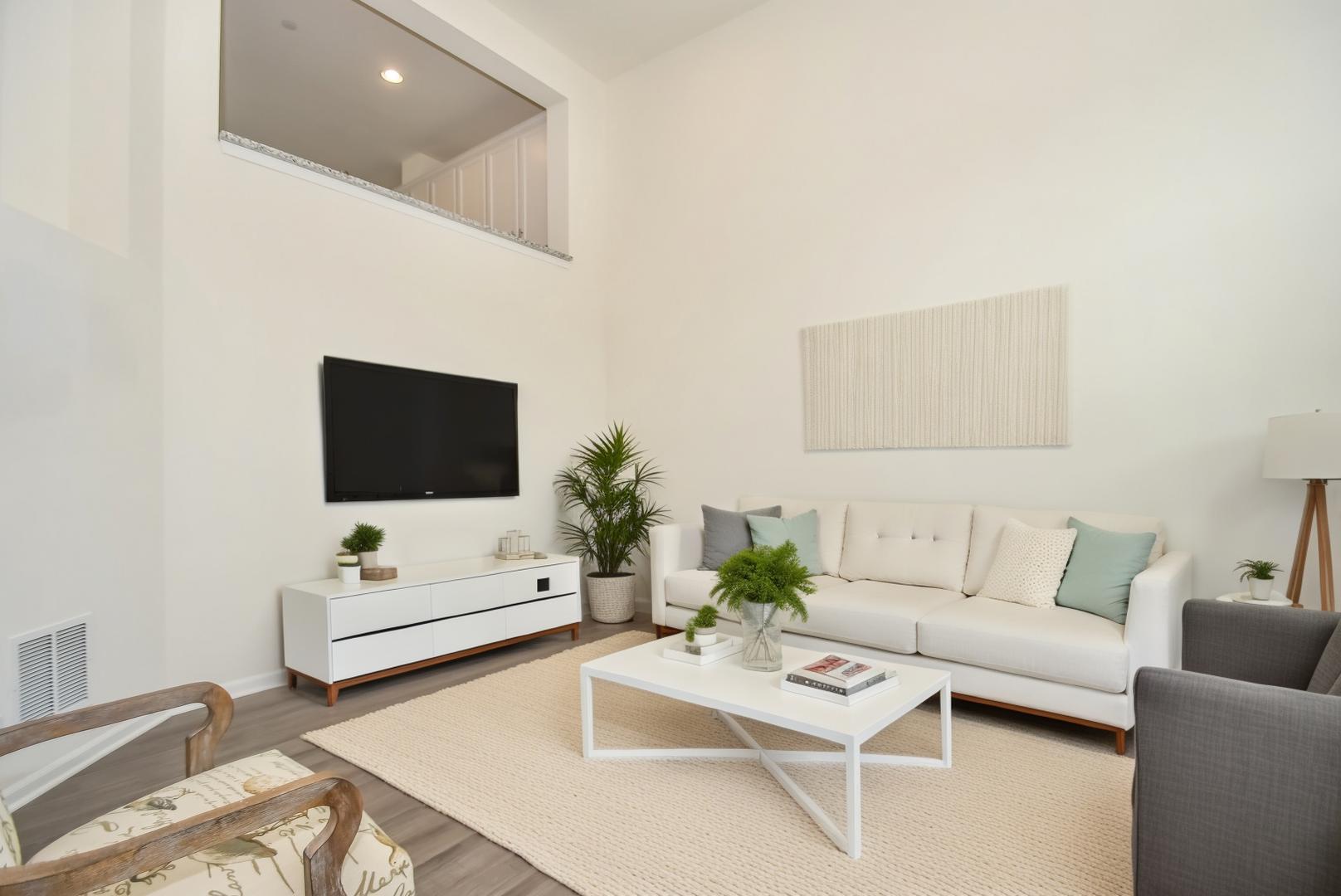 13926 South Addison Trail Homer Glen, IL 60491 - Photo 9 of 18 a living room with furniture a flat screen tv and couches