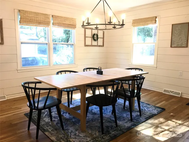 a bedroom with a bed and dresser