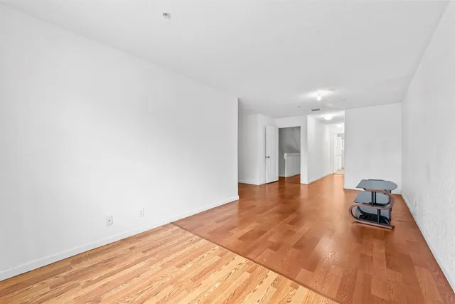 a bathroom with a sink mirror and a bathtub