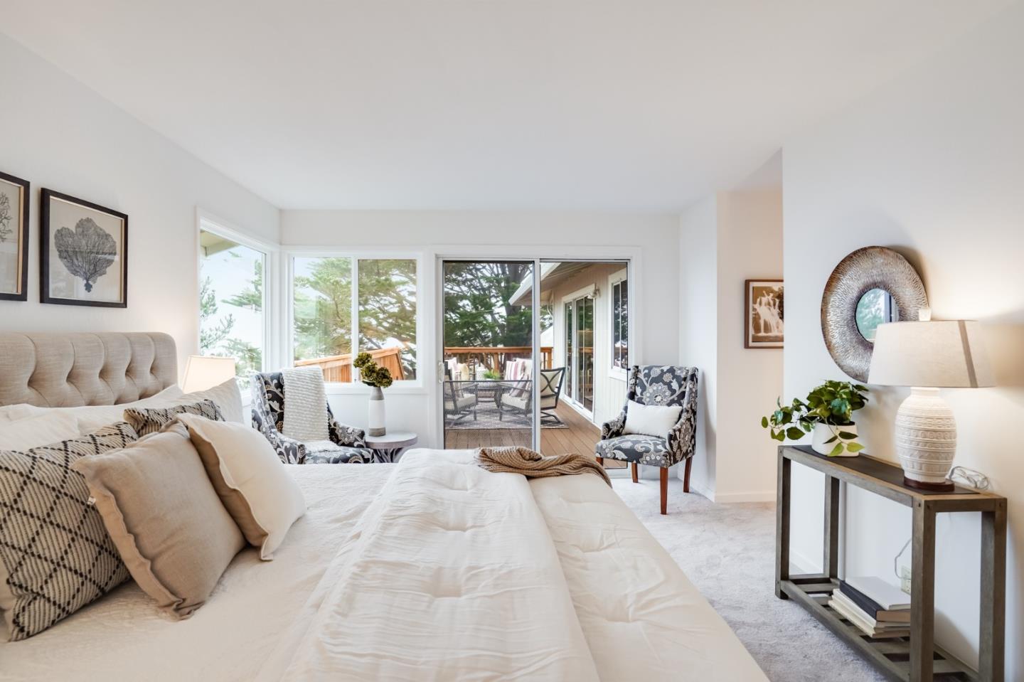 1238 Park Pacifica Avenue Pacifica, CA 94044 - Photo 18 of 32 a living room with furniture potted plant kitchen view and a large window