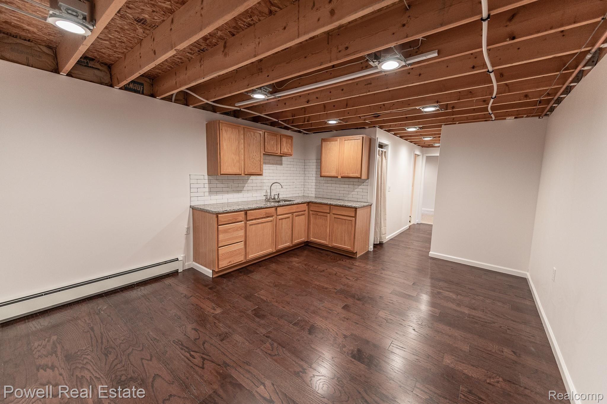 13197 Rattalee Lake Road Davisburg, MI 48350 - Photo 43 of 51 Finished basement area/Wet-bar