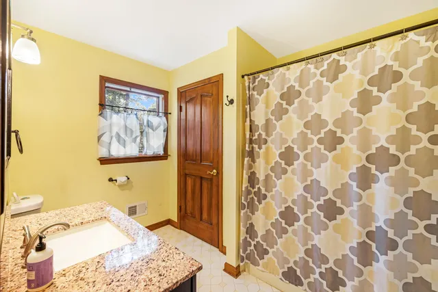 a view of a livingroom from a hallway