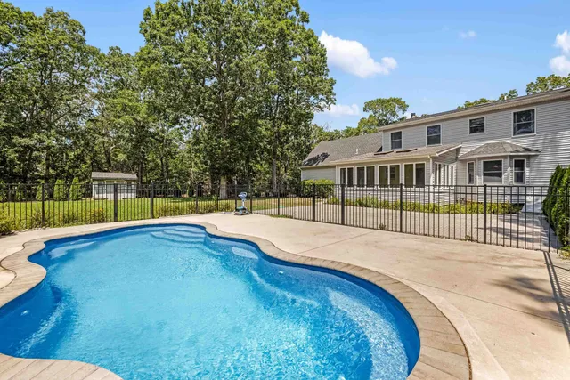 a view of outdoor space yard swimming pool and deck