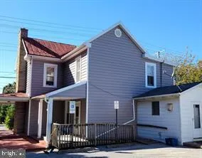 a front view of a house with glass windows