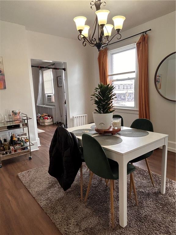 2150 Wightman Street Pittsburgh, PA 15217 - Photo 13 of 25 a view of a dining room with furniture and a chandelier
