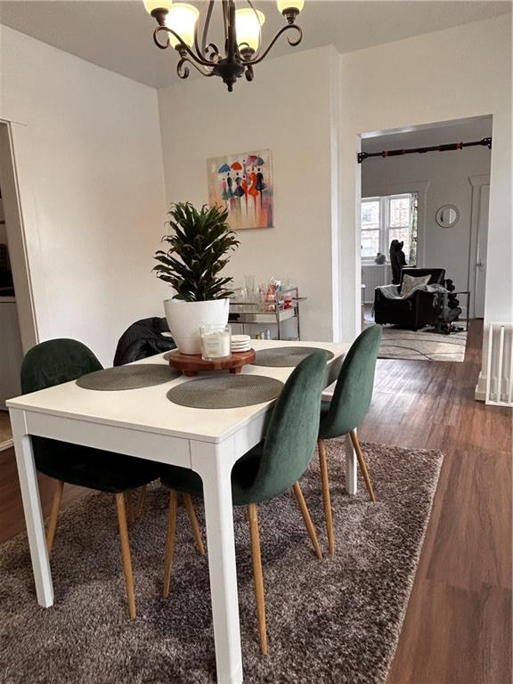 2150 Wightman Street Pittsburgh, PA 15217 - Photo 14 of 25 a view of a dining room with furniture and wooden floor