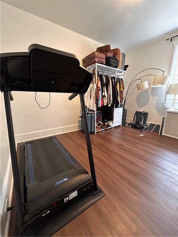 2150 Wightman Street Pittsburgh, PA 15217 - Photo 22 of 25 a room with gym equipment and wooden floor