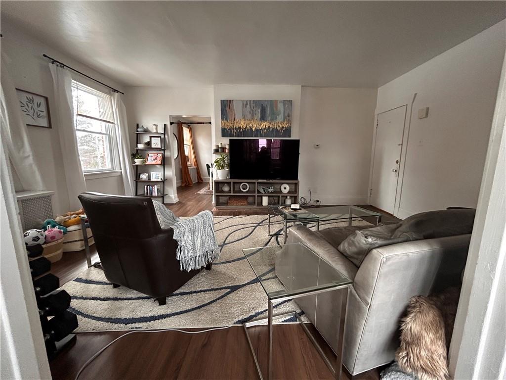 2150 Wightman Street Pittsburgh, PA 15217 - Photo 4 of 25 a living room with furniture and a flat screen tv