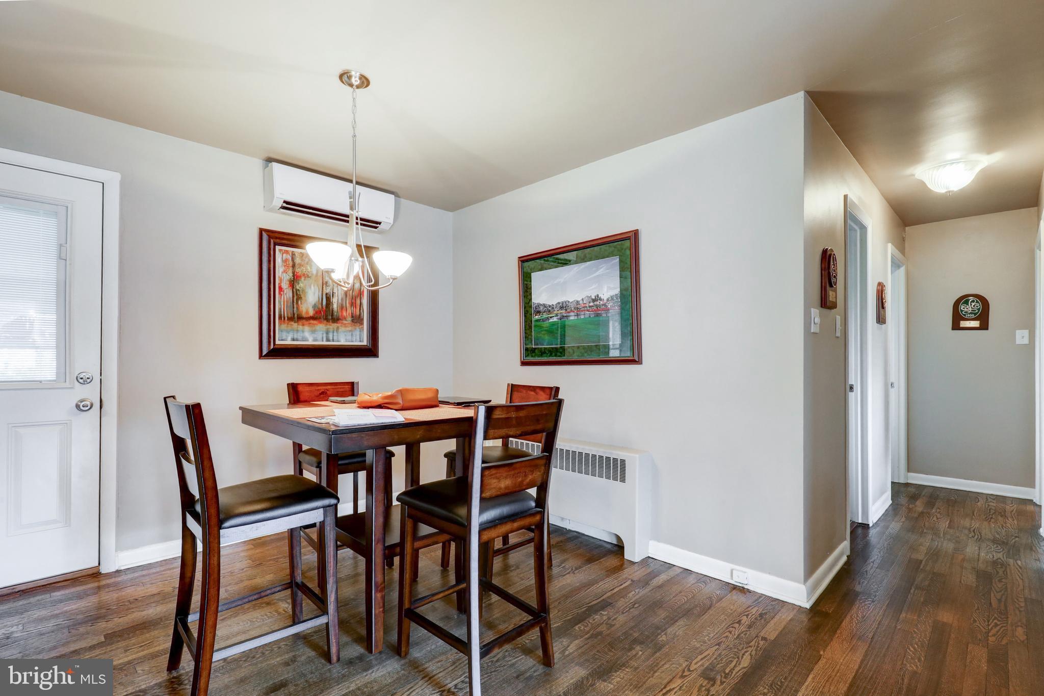 1527 Eden Road Lancaster, PA 17601 - Photo 8 of 28 a view of a dining room with furniture window and wooden floor