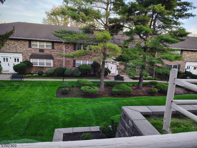54 East Maple Street Teaneck, NJ 07666 - Photo 1 of 17 a view of a house with a yard