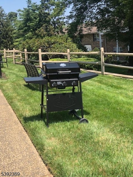 54 East Maple Street Teaneck, NJ 07666 - Photo 13 of 17 a view of a garden with sitting area