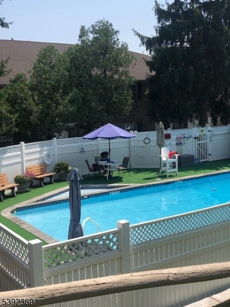 54 East Maple Street Teaneck, NJ 07666 - Photo 16 of 17 swimming pool view with a seating space