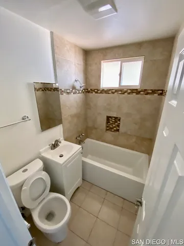a view of a bathroom with a glass door