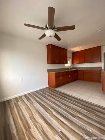 a view of staircase with wooden floor