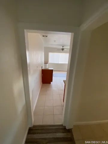 a view of kitchen with furniture and window