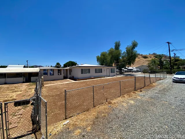 a view of a balcony with chairs
