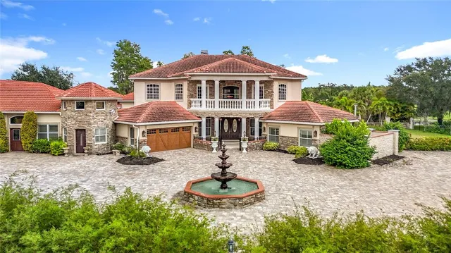 a bathroom with a sink a mirror and a bathtub