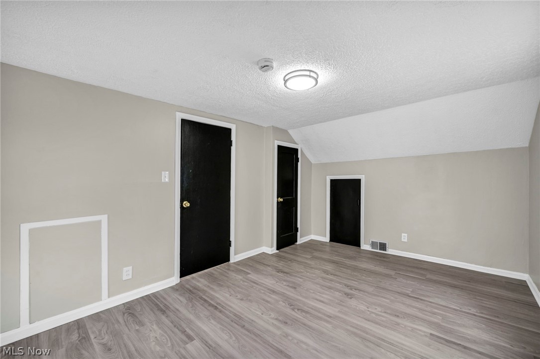 1603 Winchester Road Lyndhurst, OH 44124 - Photo 25 of 34 Upstairs bedroom 2 with a functional layout.