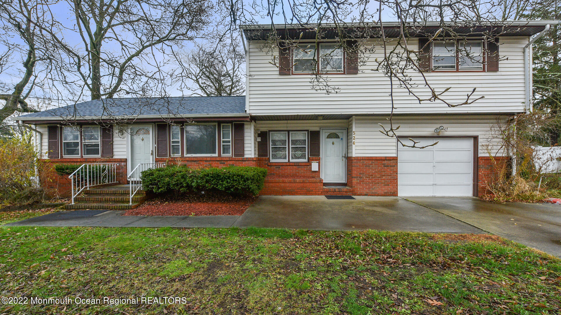 524 Lloyd Road Matawan, NJ 07747 - Photo 2 of 25 a front view of a house with garden
