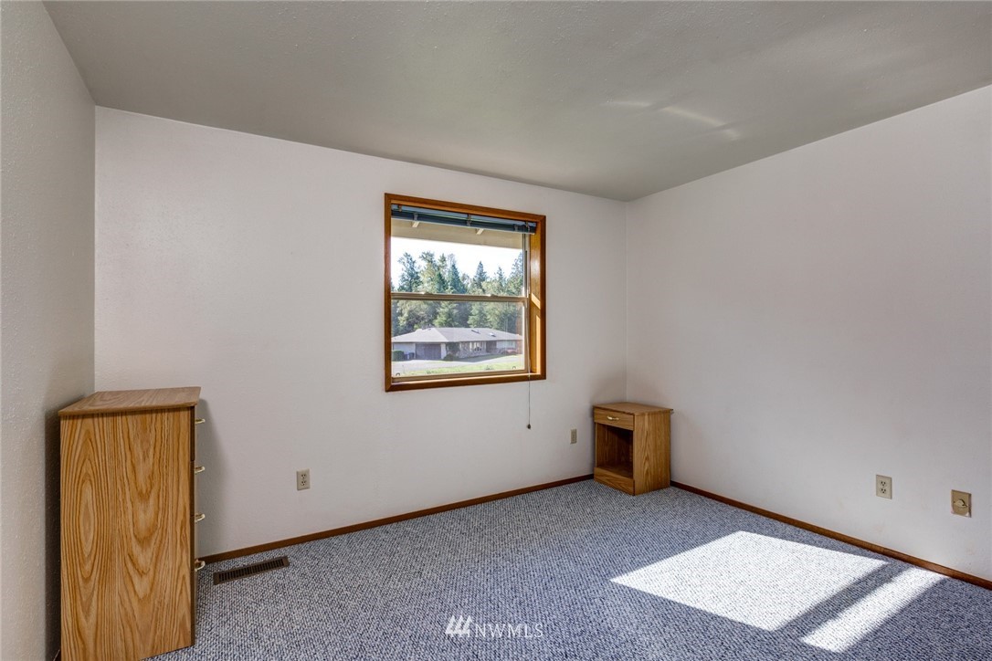 1734 Matz Road Ferndale, WA 98248 - Photo 22 of 35 a view of an empty room with a window