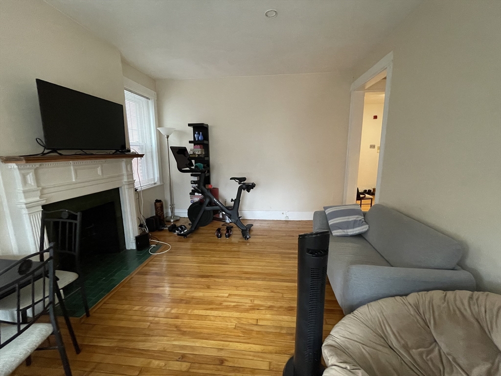 5 Spofford Road, Unit 11 Boston, MA 02134 - Photo 12 of 14 a living room with furniture and a flat screen tv