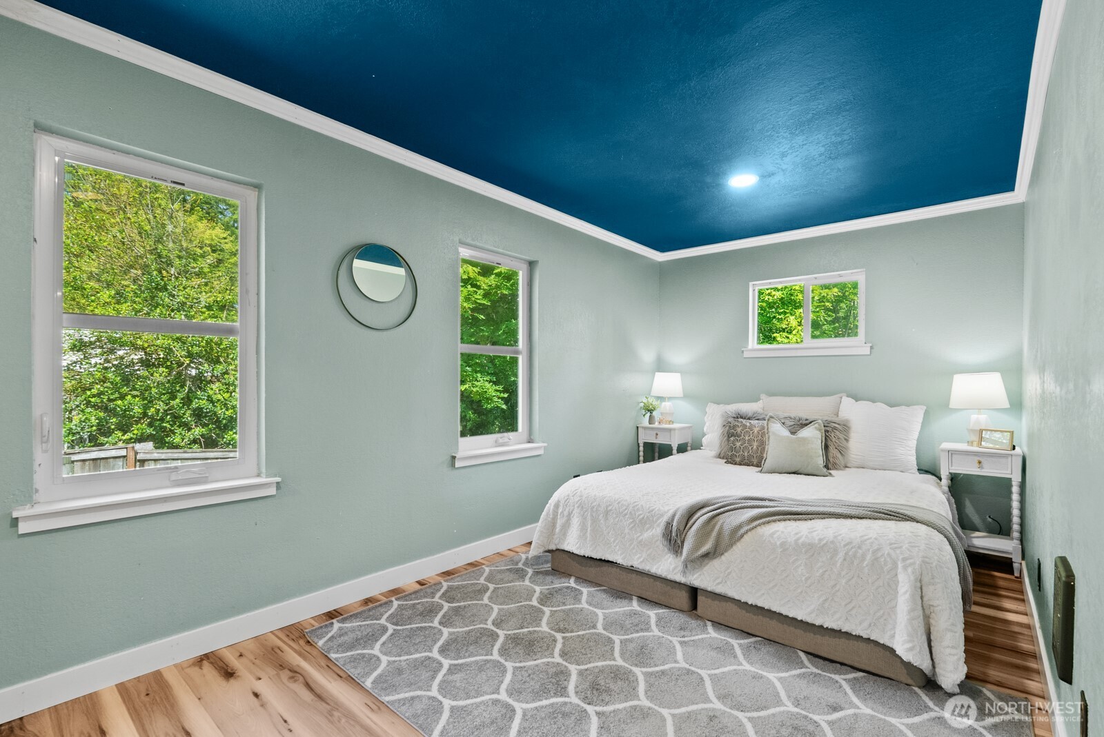 307 4th Street Steilacoom, WA 98388 - Photo 17 of 39 a bedroom with a bed and a window