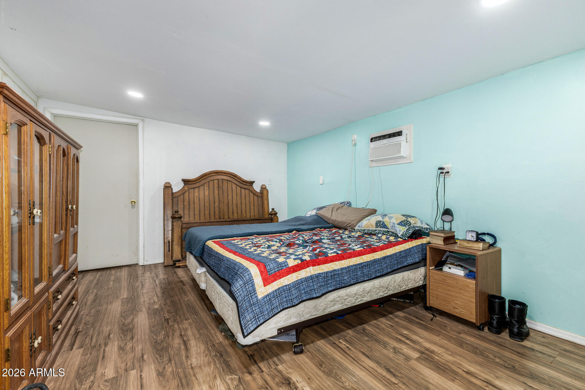 3330 East Main Street, Unit 448 Mesa, AZ 85213 - Photo 27 of 30 a bedroom with a bed and a window