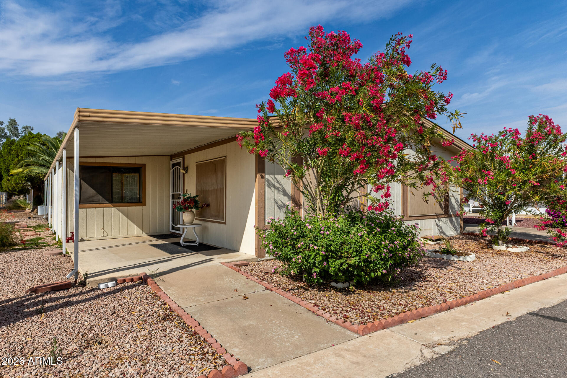 3330 East Main Street, Unit 448 Mesa, AZ 85213 - Photo 6 of 30 a front view of a house with entryway