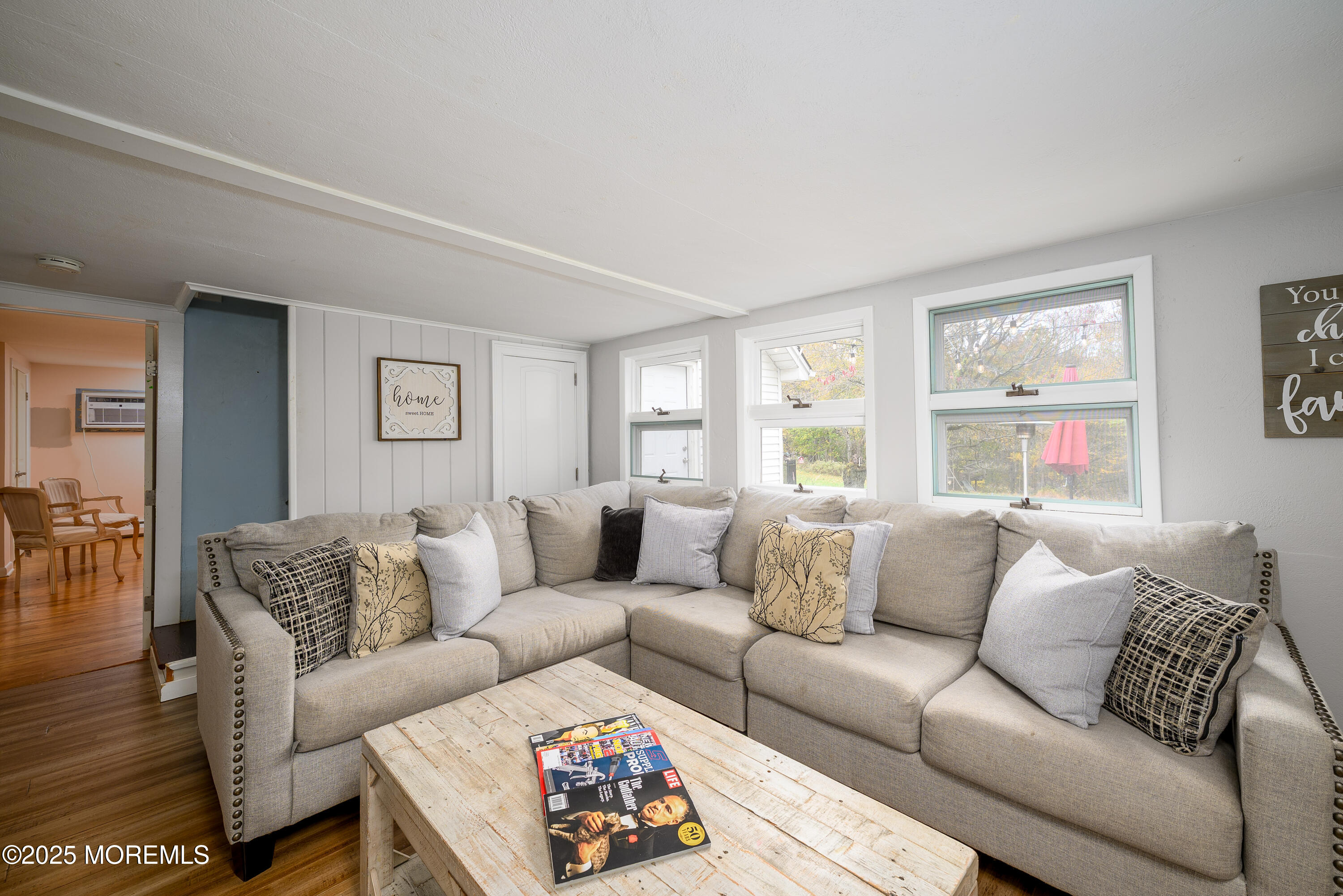 19 Reids Hill Road Morganville, NJ 07751 - Photo 16 of 33 a living room with furniture and a large window