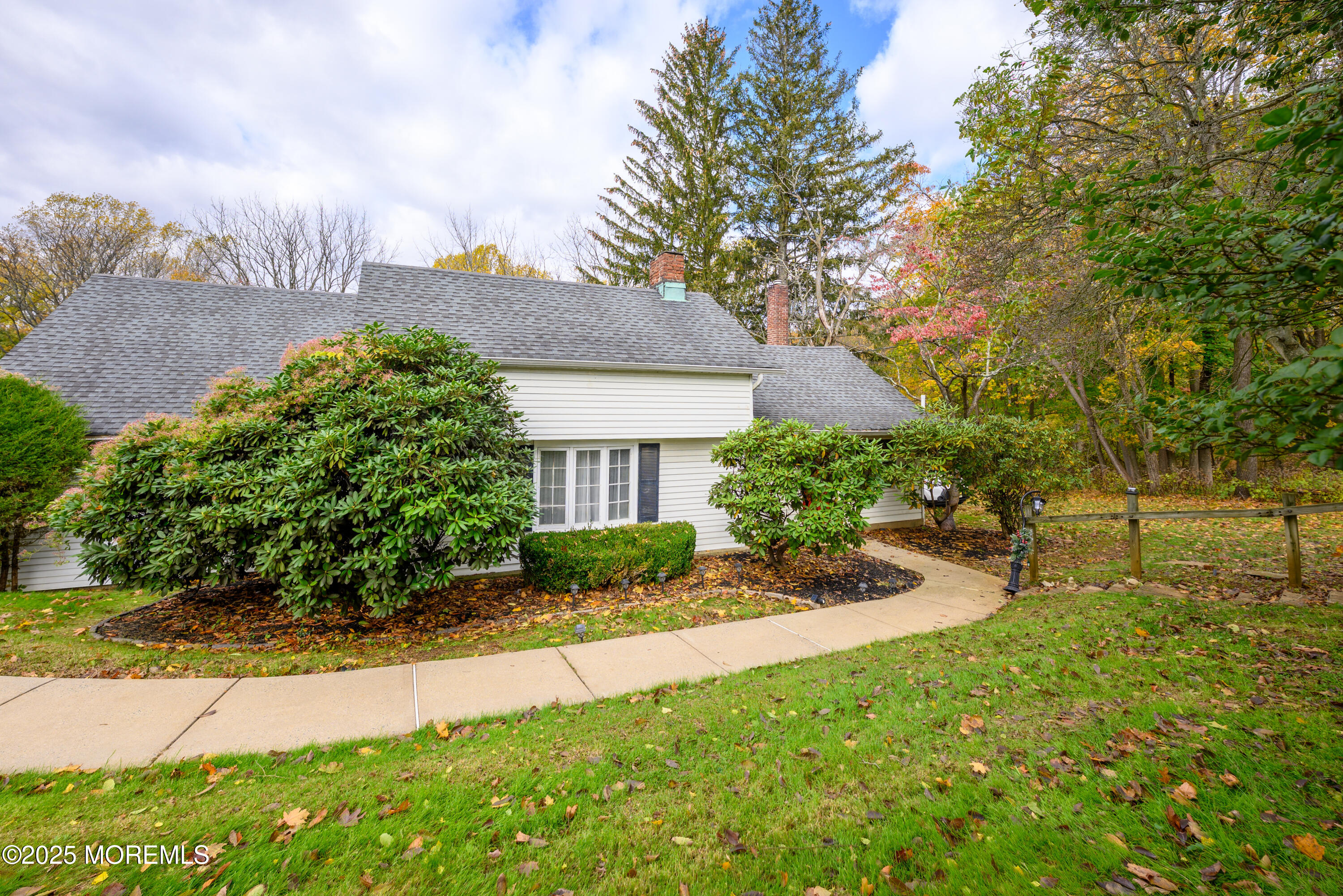 19 Reids Hill Road Morganville, NJ 07751 - Photo 2 of 33 a view of a yard in front of house