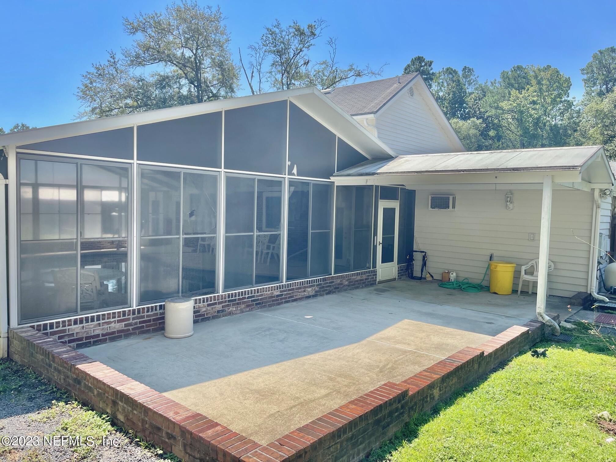 9833 Persimmon Road Macclenny, FL 32063 - Photo 21 of 34 Open Patio Backyard