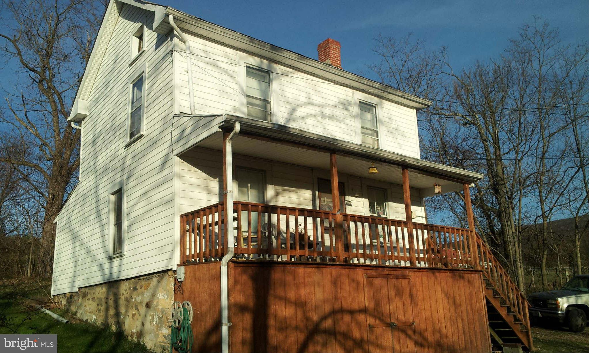 5015 Smith Road Rohrersville, MD 21779 - Photo 1 of 9 a view of a house with a street