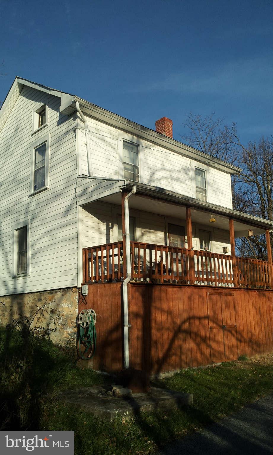 5015 Smith Road Rohrersville, MD 21779 - Photo 6 of 9 a view of a street with potted plants