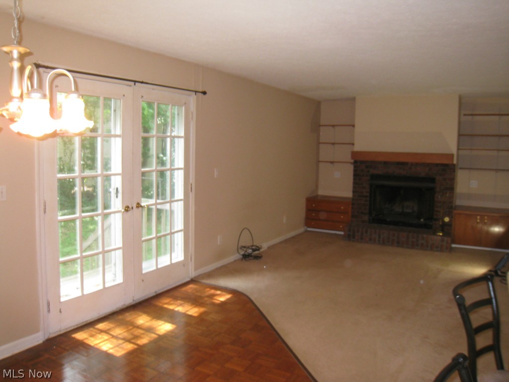 4674 Liberty Road South Euclid, OH 44121 - Photo 3 of 18 French doors off the family room and dining room lead to a patio area and deep yard.
