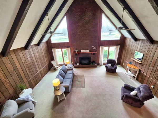 a living room with furniture and a window