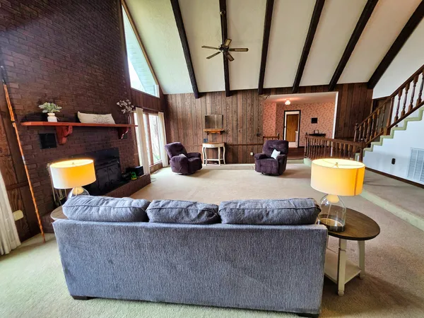 a kitchen with a refrigerator and a sink