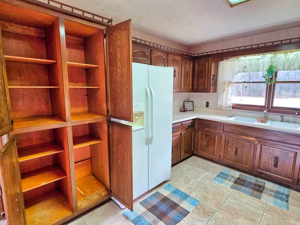 a view of a room with wooden walls