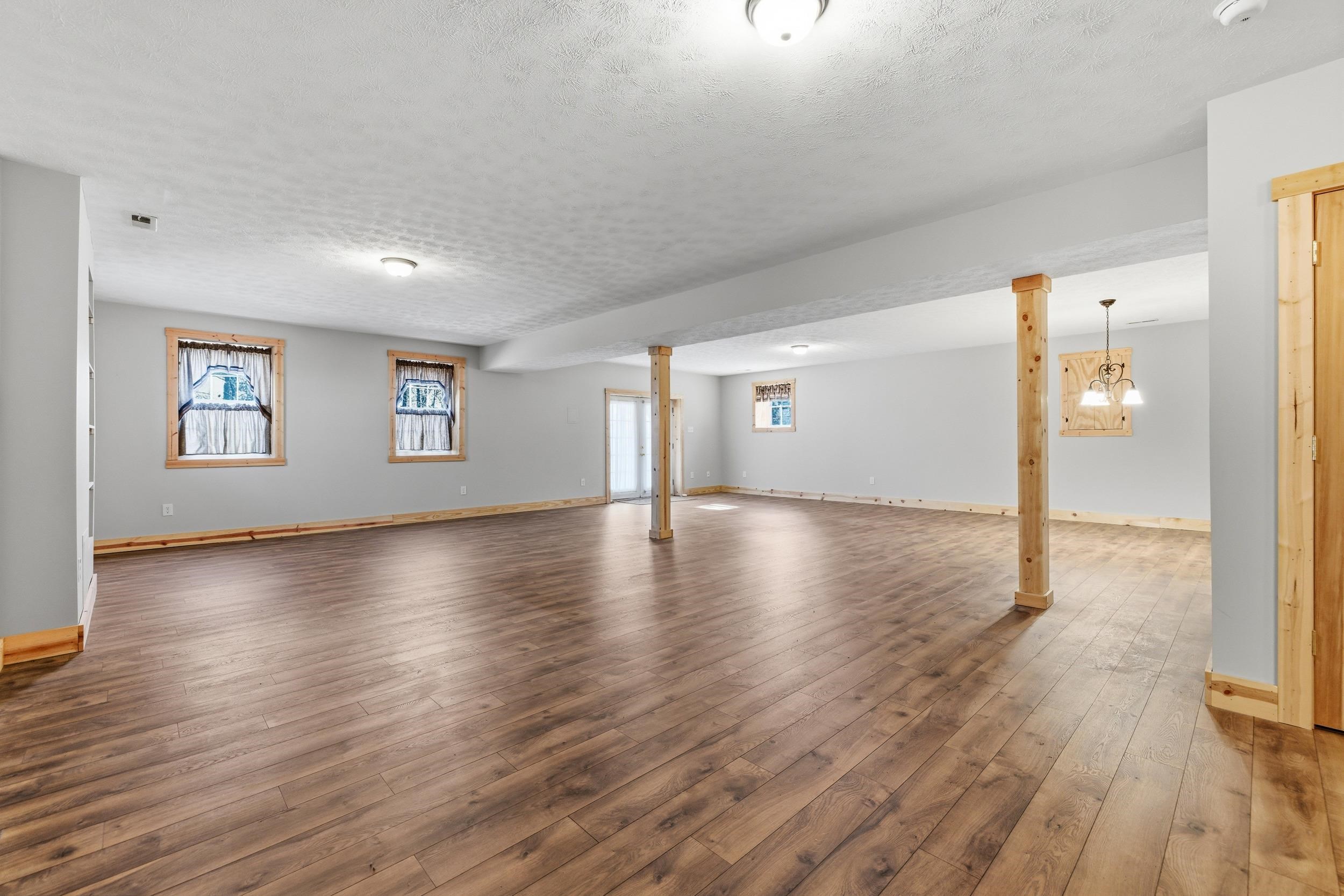 86 Maple Avenue Mount Jackson, VA 22842 - Photo 25 of 49 a view of a livingroom with wooden floor and a window