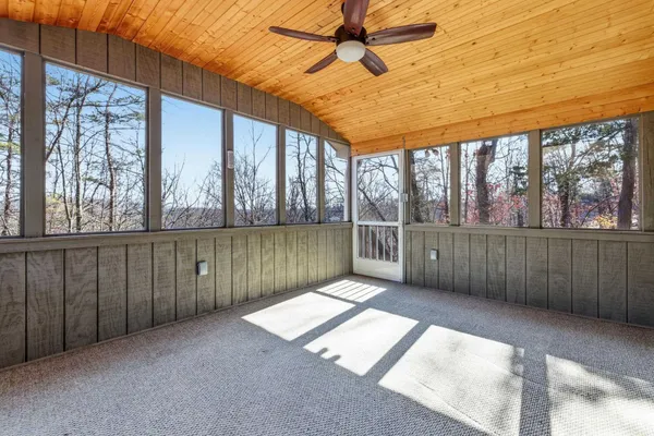 a view of a room with a large window