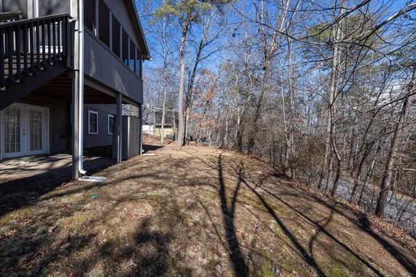 a view of a backyard of the house
