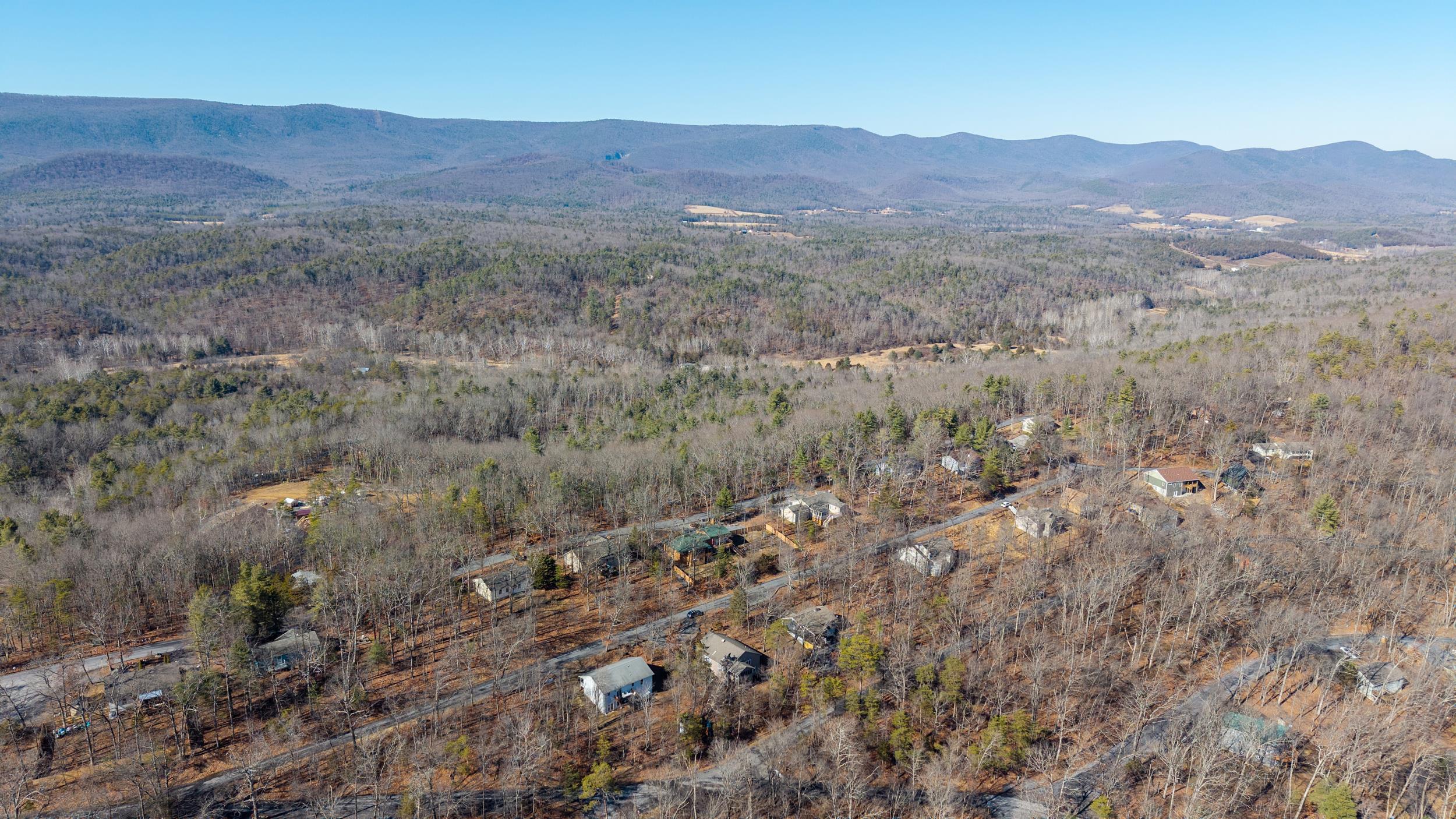 86 Maple Avenue Mount Jackson, VA 22842 - Photo 48 of 49 a view of a lush green hillside and a houses