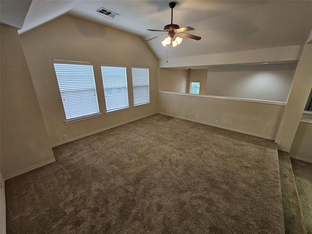 7341 Danbridge Lane Frisco, TX 75035 - Photo 11 of 14 wooden floor in an empty room with a window