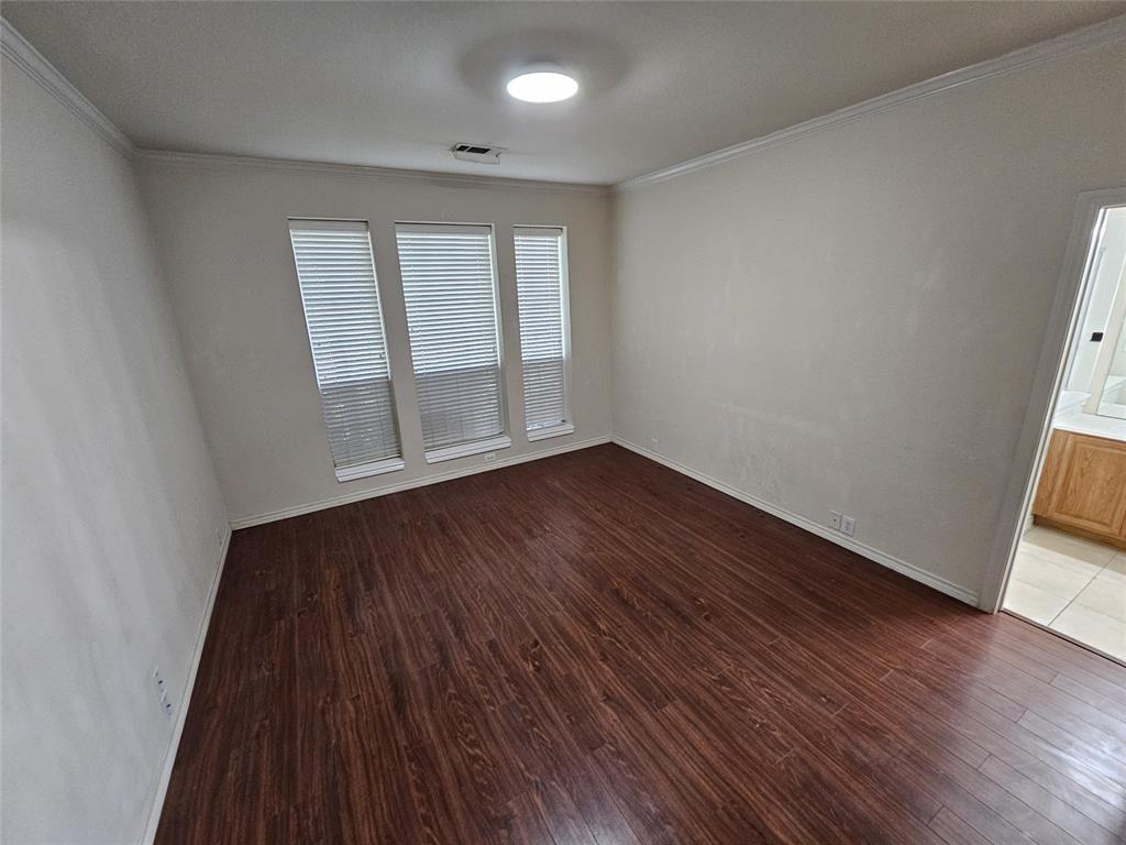 7341 Danbridge Lane Frisco, TX 75035 - Photo 5 of 14 wooden floor in an empty room with a window