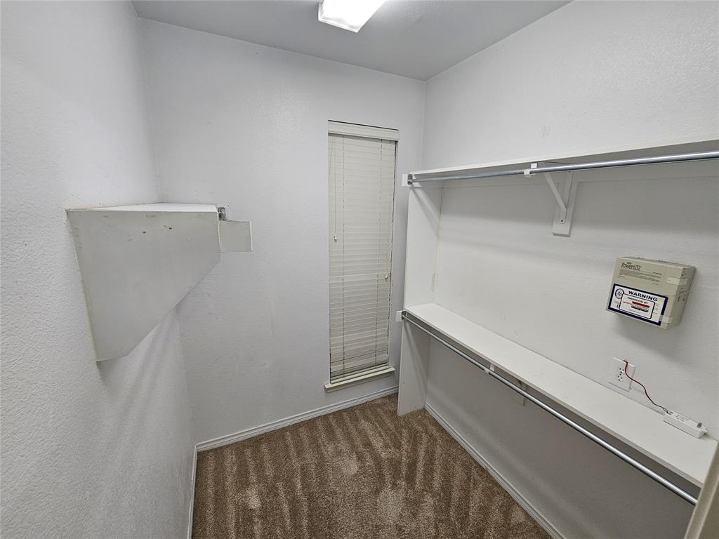 7341 Danbridge Lane Frisco, TX 75035 - Photo 8 of 14 a view of an empty walk in closet