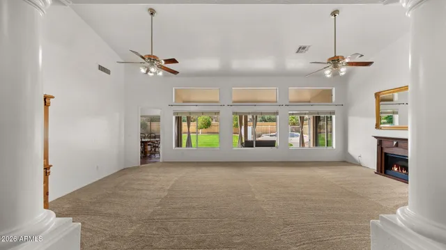 a view of a patio with a backyard