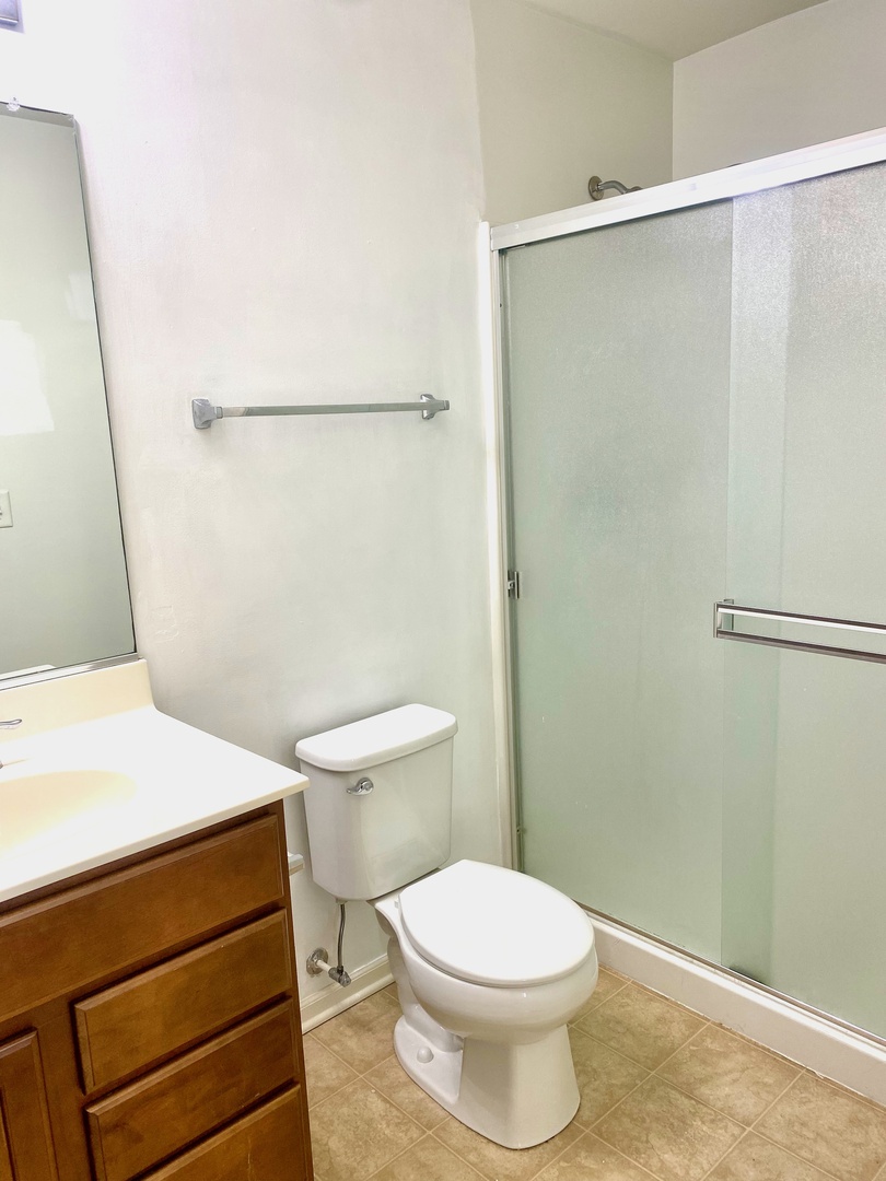 308 Niagara Drive Volo, IL 60073 - Photo 11 of 17 a white toilet sitting next to a bathroom sink