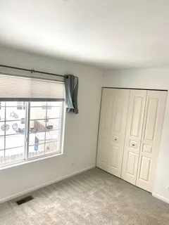 a bathroom with a shower and a toilet